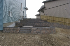 Rustic Pisa 2 with Charcoal capstone tiered block retainer wall with steps
