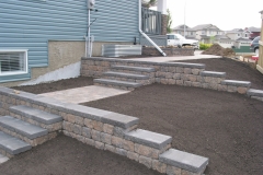 Rustic Pisa 2 with Charcoal capstone tiered block retainer wall with steps